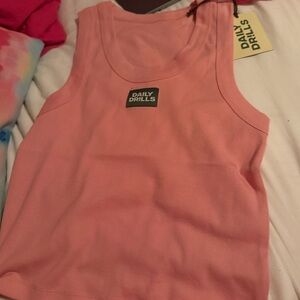 Pink daily drills tank